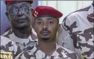  ?? (AP/Tele Tchad) ?? Mahamat Idriss Deby Itno (center), the son of Chadian President Idriss Deby Itno, is seen during a military broadcast Tuesday to announce the death of his father. The military named the 37-yearold as Chad’s interim leader.