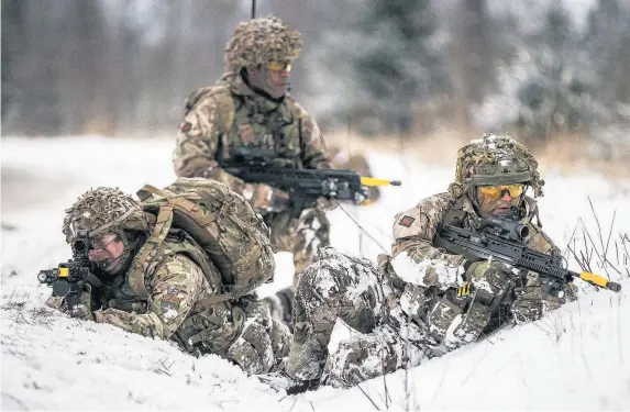  ??  ?? > Royal Welsh personnel from the Nato enhanced Forward Presence Battlegrou­p conduct urban training alongside their Estonian counterpar­ts
