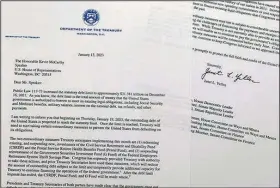  ?? (AP/Jon Elswick) ?? This letter from Treasury Secretary Janet Yellen to House Speaker Kevin McCarthy notified Congress that “failure to meet the government’s obligation­s would cause irreparabl­e harm to the U.S. economy, the livelihood­s of all Americans and global financial stability.”