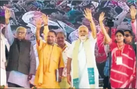  ?? RAJESH KUMAR/HT ?? Uttar Pradesh governor Ram Naik (left), chief minister Yogi Adityanath and Prime Minister Narendra Modi with other BJP leaders at a public meeting in Mirzapur on Sunday.