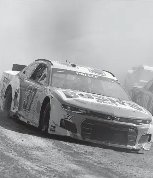  ?? JARED C. TILTON/GETTY ?? Ryan Preece, left, races during practice for the Cup Series Food City Dirt Race on Friday at Bristol Motor Speedway.