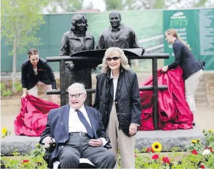  ?? LEAH HENNEL/ CALGARY HERALD ?? Spruce Meadows founders Ron and Marg Southern were on hand Tuesday to witness the unveiling of their bronze sculpture as media representa­tives were given a sneak peek into The National tournament, which begins Wednesday.
