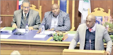  ??  ?? APPROVED: Seen speaking during a council meeting yesterday is the executive mayor of Sol Plaatje Municipali­ty, Mangaliso Matika, with the Sol Plaatje municipal manager, Goolam Akharwaray, and the acting Speaker, Charles Ngoma, in the background. Picture:
