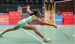  ?? — AP ?? P. V. Sindhu in acton against Tai Tzu Ying in Kuala Lumpur on Saturday.