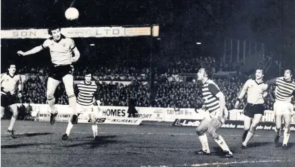  ??  ?? Davi Gwyther heads towards goal during another Newport County attack against Carl Zeiss Jena in the European Cup Winners’ Cup quarter-final tie at Somerton Park in 1981