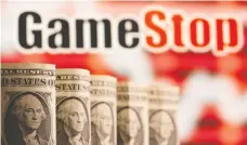  ?? DADO RUVIC / ILLUSTRATI­ON / REUTERS ?? The effort to squeeze short-sellers took GameStop's share price well
beyond any rational fundamenta­l valuation, Carson Block writes.