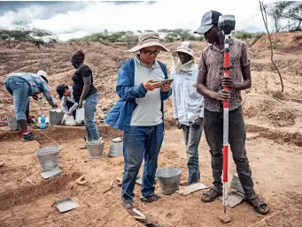  ?? ?? Members of a China-Kenya joint archaeolog­ical programme work at a site in Baringo, Kenya, on 3 November