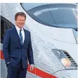  ?? FOTO: SCHMIDT/DPA ?? Bahnchef Richard Lutz hatte gestern einen guten Tag.