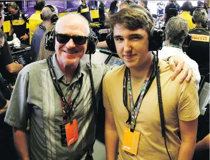  ?? INFINITI ?? Andrew McCredie and son Callum get in some quality time at the Renault Sport F1 team garage at the 2018 Canadian Grand Prix in Montreal.