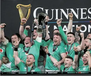  ?? | PHOTO : AFP ?? L’Irlande de Peter O’Mahony remporte le Tournoi.