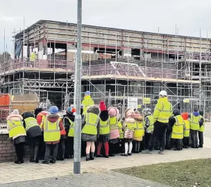  ??  ?? ●●St. Mary’s CE Primary school visiting the new Kirkholt health centre