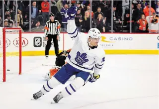  ?? DERIK HAMILTON THE ASSOCIATED PRESS ?? Toronto Maple Leafs’ Andreas Johnsson reacts after scoring the game-winning goal past Flyers goalie Brian Elliott in a shootout Saturday in Philadelph­ia. The Maple Leafs won, 4-3.