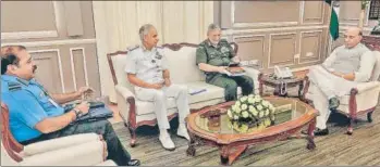  ?? PTI ?? From left: Chief of the Air Staff, Air Chief Marshal RKS Bhadauria; Chief of the Naval Staff, Admiral Karambir Singh; and Chief of the Army Staff General Bipin Rawat call on Union defence minister Rajnath Singh in New Delhi on Monday.