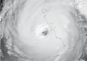  ?? AFP ?? El ojo del huracán categoría 4 antes de entrar a Florida, en imagen de satélite