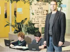  ?? LIAM RICHARDS ?? Students at Martensvil­le’s Venture Heights school, such as Kaleb Braun, left, and Emilio Rodriguez, are not allowed to have cellphones in hand during the school day, says principal Ron Biberdorf, right.