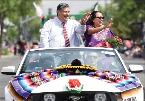  ?? RECORDER PHOTOS ?? Grand Marshals Rudy and Maria Roman wave during the 91st annual Cinco de Mayo Parade Saturday, May 5, in downtown Portervill­e. This year’s theme was ‘Together Cultivatin­g Unity and Community Spirit.’ Look for more parade photos this week in The Recorder.