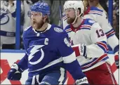  ?? CHRIS O'MEARA — THE ASSOCIATED PRESS ?? Lightning center Steven Stamkos, left, is elated after scoring against the Rangers in Game 6Saturday night.