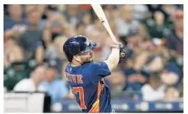  ?? BOB LEVEY/GETTY IMAGES ?? Houston Astros second baseman Jose Altuve, at 5-foot-6, is a three-time batting champion.