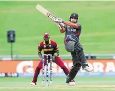  ?? AP ?? Hit maker UAE batsman Amjad Ali bats at the ICC World Cup. The UAE were playing in the tournament for the first time since 1996.