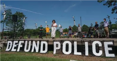  ?? The Associated Press ?? ■ In this June 7, 2020, file photo, Alondra Cano, a city council member, speaks during “The Path Forward” meeting at Powderhorn Park in Minneapoli­s. The focus of the meeting was the defunding of the Minneapoli­s Police Department.