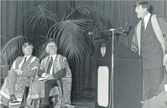  ?? ?? Stephen Fry speaks at his Dundee University rectorial installati­on in 1992, while Michael Hamlin and Sir James Whyte Black look on.