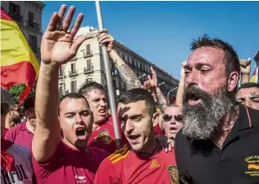  ??  ?? No need to break away: Demonstrat­ors reacting during the protest for unity at Marqus de la Argentera Avenue in Barcelona. — Bloomberg