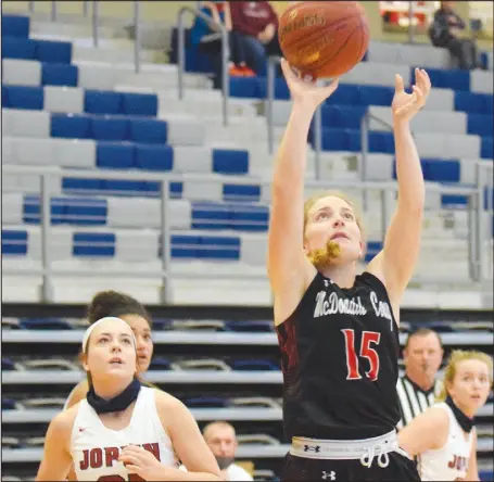  ?? RICK PECK/ SPECIAL TO MCDONALD COUNTY PRESS ?? McDonald County’s Reagan Myrick scores a bucket during the Lady Mustangs’ 36-34 win over Joplin on Dec. 12 in the Lady Eagle Classic.