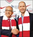  ?? SARAH STIER / GETTY IMAGES ?? “Gregg isn’t just the right choice, Gregg is the best choice,” U.S. Soccer Federation President Carlos Cordeiro (left) said of new men’s national team coach Gregg Berhalter.