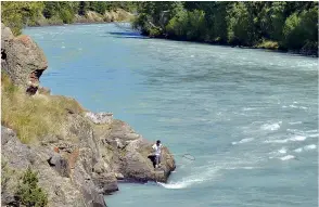  ??  ?? Below, from left: Tsilhqot’in fisherman on the Chilko River; the confluence of the Chilcotin and Chilko Rivers; Nives Bliss on her old David Brown tractor.