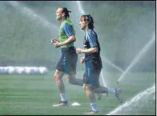  ?? AFP ?? Croatia's Luka Modric (R) and Domagoj Vida during training.