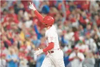  ?? MATT ROURKE/AP ?? Rhys Hoskins and the Phillies agreed on a one-year, $12 million contract to avoid arbitratio­n.