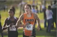  ?? Morgan Timms ?? Abigail Gunther competes Friday (Oct. 26) during the Los Alamos Invitation­al cross-country meet at the Los Alamos Golf Course.