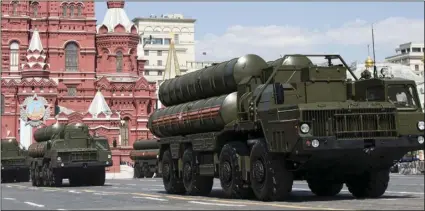  ?? AP PHOTO/ALEXANDER ZEMLIANICH­ENKO ?? In this file photo taken on May 9, 2016, Russian the S-300 air defense missile systems drive during the Victory Day military parade marking 71 years after the victory in WWII in Red Square in Moscow, Russia.