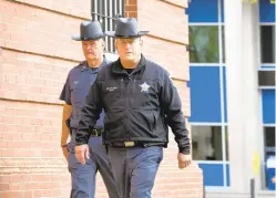  ?? LLOYD FOX/BALTIMORE SUN ?? Harford County Sheriff Jeff Gahler, right, challenged a law passed by the Maryland General Assembly that requires the state attorney general’s office to be the primary investigat­or when someone dies in an encounter with police.