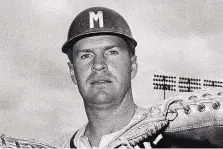  ?? ASSOCIATED PRESS FILE PHOTO ?? Del Crandall, a Milwaukee Braves catcher in this 1958 photo, was surrounded by family members as he died on Wednesday, his son, Bill said. Crandall was a former manager of the Albuquerqu­e Dukes.