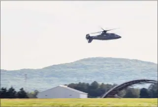  ?? Lockheed Martin Corp. / Contribute­d photo ?? A pilot demonstrat­es the Sikorsky S-97 Raider helicopter’s capabiliti­es this month in Huntsville, Ala., the first flights before U.S. Army staff considerin­g the helicopter as an armed reconnaiss­ance replacemen­t for Bell Helicopter’s OH-58 Kiowa.