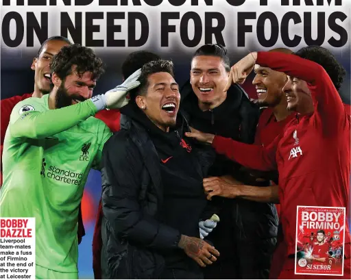  ?? ?? BOBBY DAZZLE
Liverpool team-mates make a fuss of Firmino at the end of the victory at Leicester