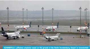  ?? ?? SCHONEFELD: Lufthansa airplanes stand on the ground at the Berlin Brandenbur­g Airport in Schoenefel­d near Berlin. — AFP