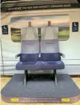  ?? Andy Coward ?? The new East Midlands Railway Class 810 Aurora Standard Class seats on display in the main entrance at Nottingham station on November
27. The seats feature a wool-rich moquette in EMR’S colours with cream leather headrests. They also include plug sockets and USB ports.