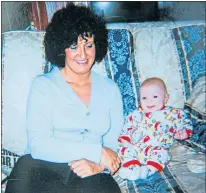  ??  ?? Ruth Hughes with baby Gordon in 1998