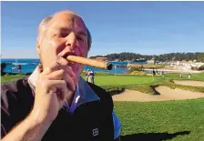  ?? ERIC RISBERG/ASSOCIATED PRESS ?? Rush Limbaugh smokes while waiting to tee off during a golf tournament in Pebble Beach, Calif., in 2001. Limbaugh had expressed skepticism about the dangers of smoking.