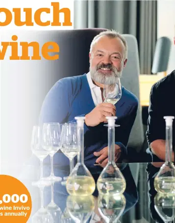  ??  ?? Graham Norton with Invivo Wines founders Rob Cameron and Tim Lightbourn­e at a sauvignon blanc blending session last year.