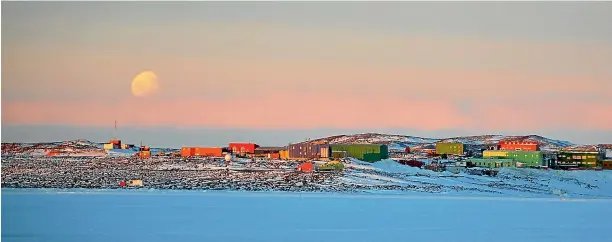  ?? ANTARCTICA.GOV.AU ?? The moon rises over Australia’s Davis base at Antarctica as the icy continent becomes the latest cause in China’s diplomatic clashes with Australia.