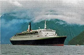  ??  ?? The Queen Elizabeth 2 sails into Milford Sound in 1978.