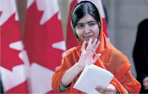  ?? LARS HAGBERG/GETTY IMAGES ?? Pakistani Nobel Peace Laureate Malala Yousafzai leaves Parliament Hill after receiving honorary Canadian citizenshi­p in Ottawa, on Wednesday.