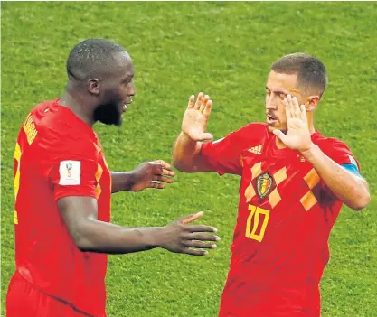  ??  ?? Belgium’s Romelu Lukaku, left, celebrates his goal against Panama with Eden Hazard.