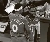  ?? Tony Gutierrez / Associated Press ?? The Mavericks’ Josh Richardson, left, joins Tim Hardaway Jr. after Hardaway hit a 3-pointer.