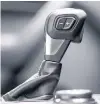  ??  ?? Manual mode switch on gear lever isn’t that ergonomica­lly sound.
