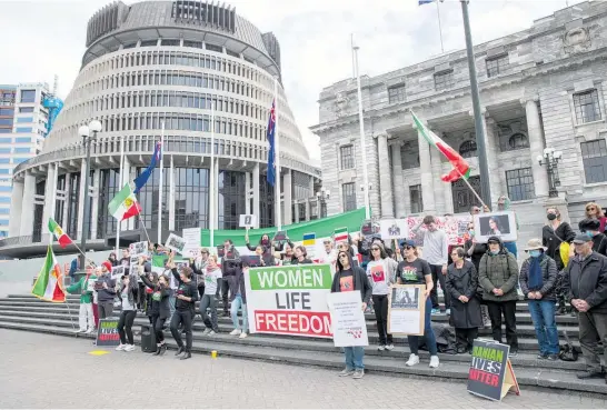  ?? Photo / Mark Mitchell ?? The NZ Iranian community protesting at Parliament in October.