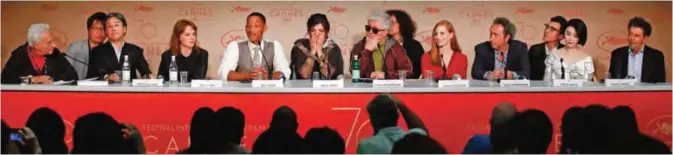  ??  ?? (From left 1st Row) French journalist Henri Behar, South Korean director and member of the Feature Film jury Park Chan-wook, German director and member of the Feature Film jury Maren Ade, US actor and member of the Feature Film jury Will Smith, French...